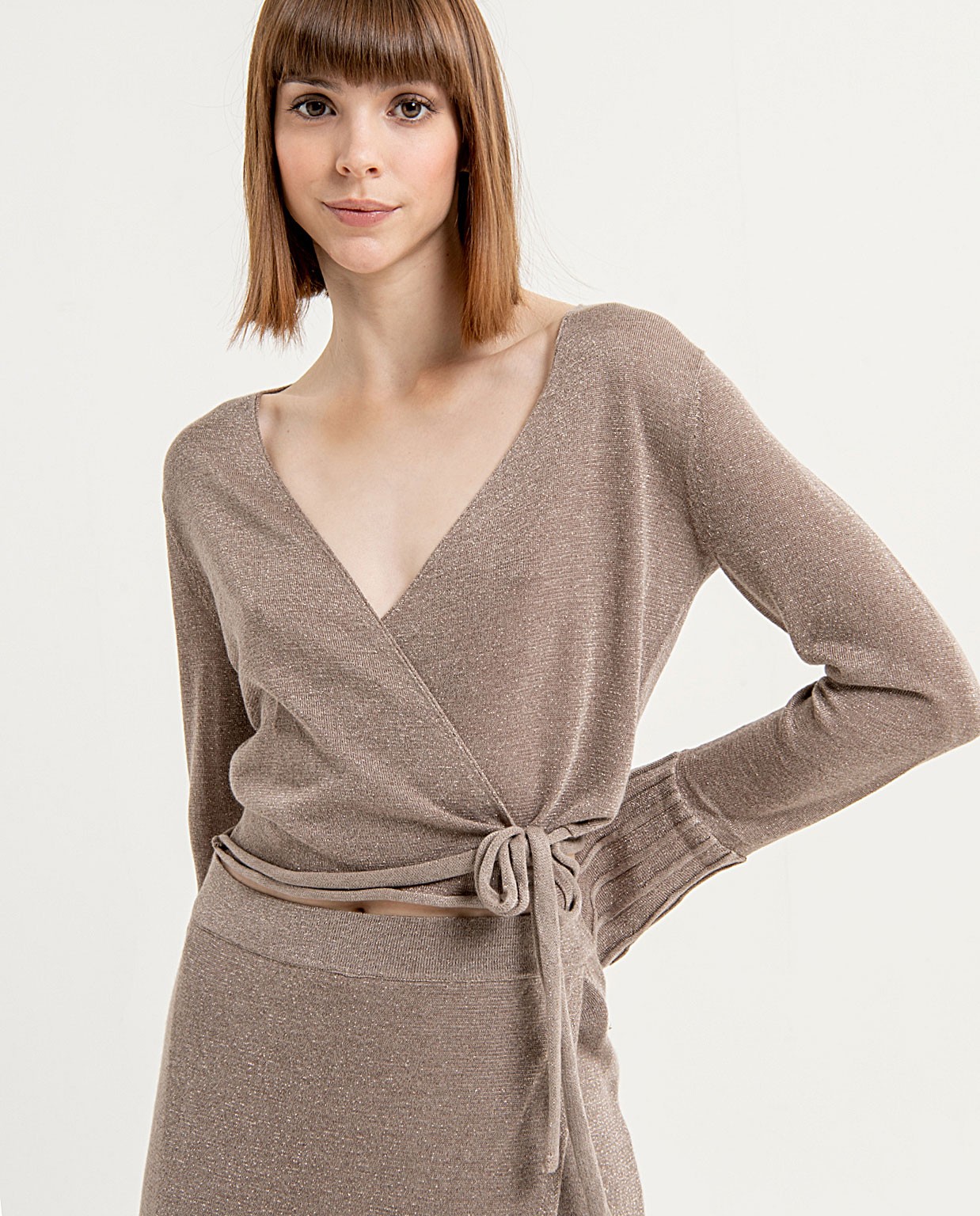 Plain lurex crossover top with frill cuffs Stone
