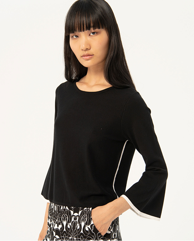 Knitted bell sleeve sweater...