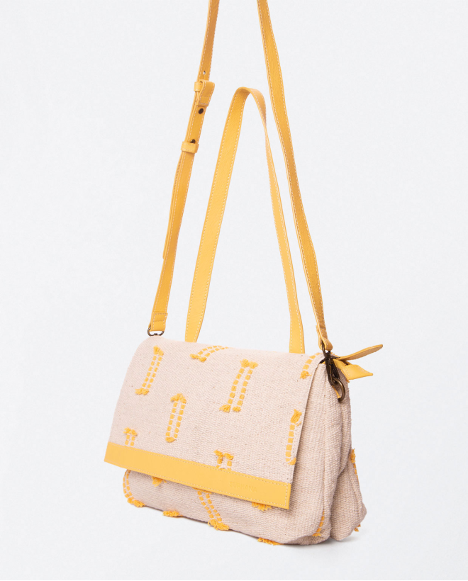 Shoulder bag with flap and short handle. Yellow