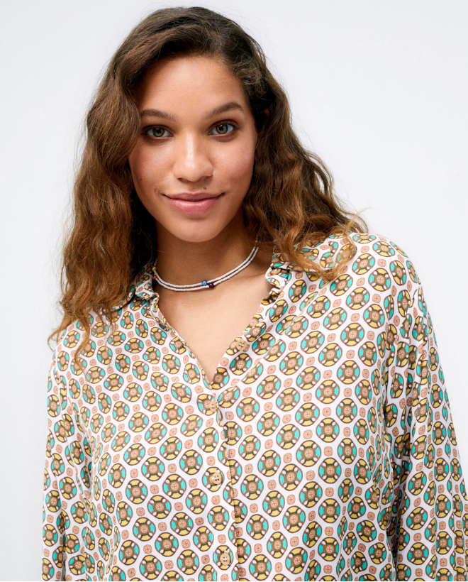 Chemise à manches longues. Taille élastiquée. Impr Jaune