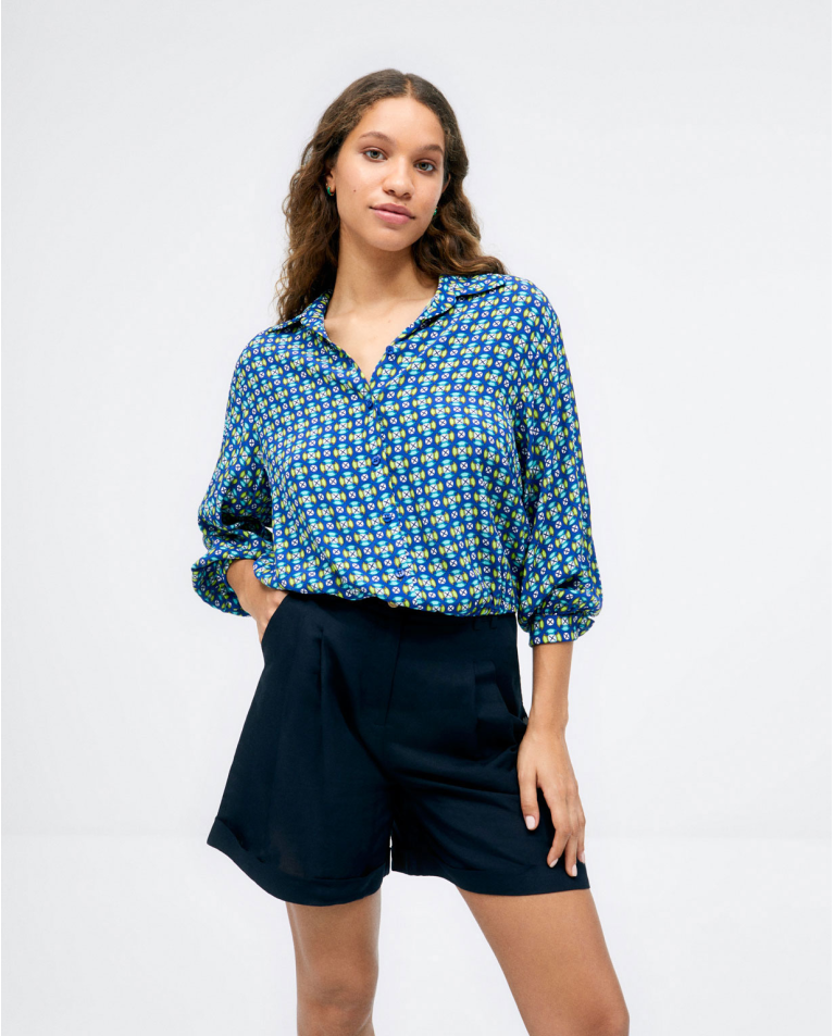 Chemise à manches longues. Taille élastiquée. Impr Bleu