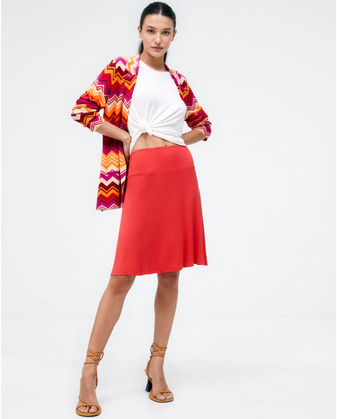 Veste en tricot avec poches. Rayures Fushia