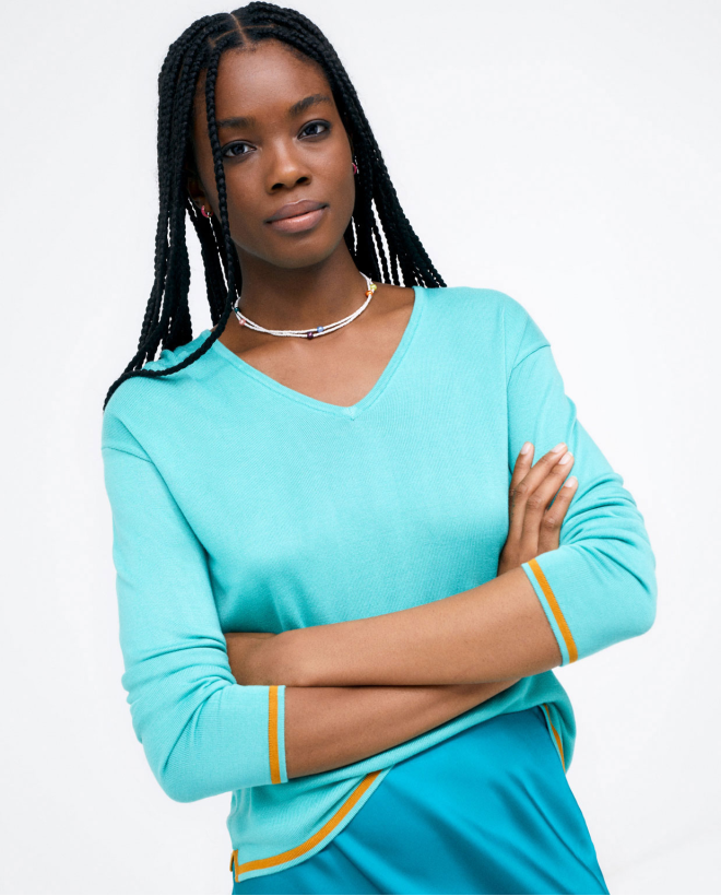 Pull en tricot. Col en V. Turquoise