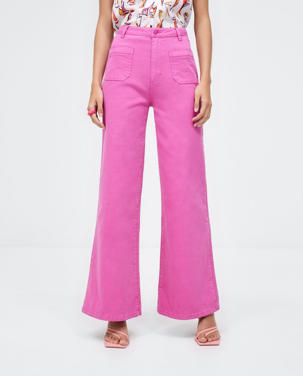Pantaloni lunghi in denim con tasche. Tinta unita  Fucsia