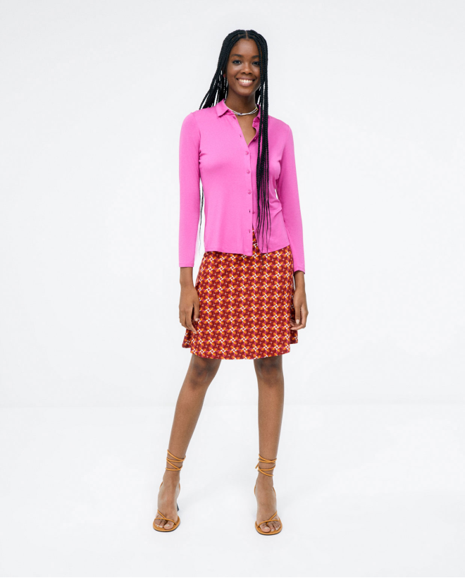 Chemise à manches longues. Tissu élastique Fushia