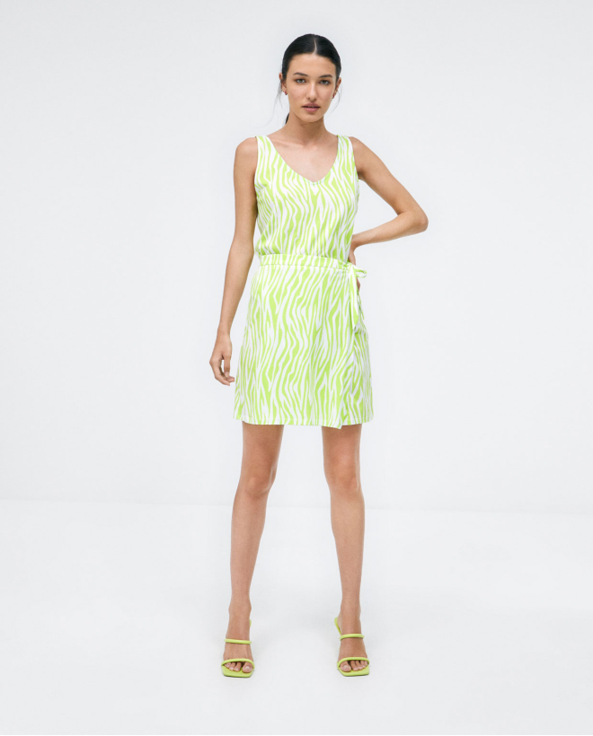 Gonna sarong corta e annodata. Stampa Verde acido