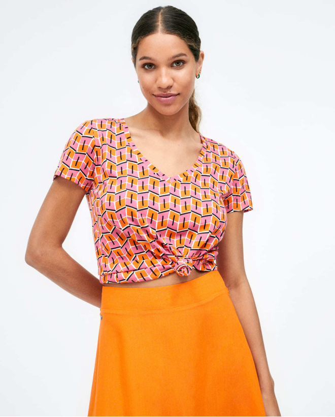 Jupe midi évasée en maille. Orange