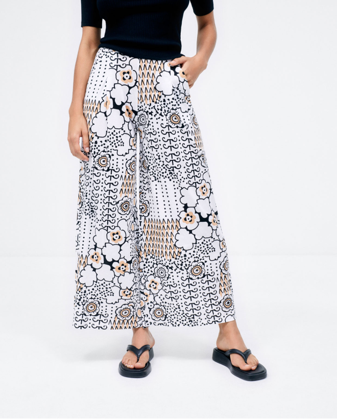 Pantaloni lunghi larghi. Elastico. Stampa Bianco sporco