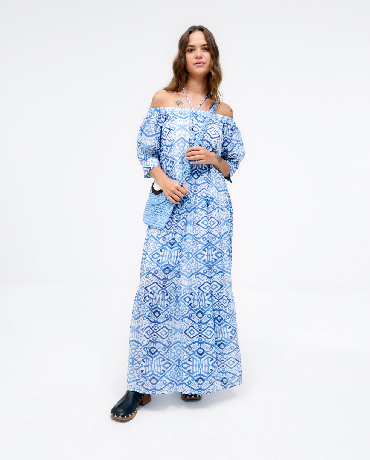 Off shoulder long dress. e print Blue