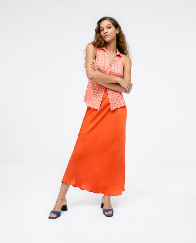 Chemise sans manches avec des manches à volants. E Orange