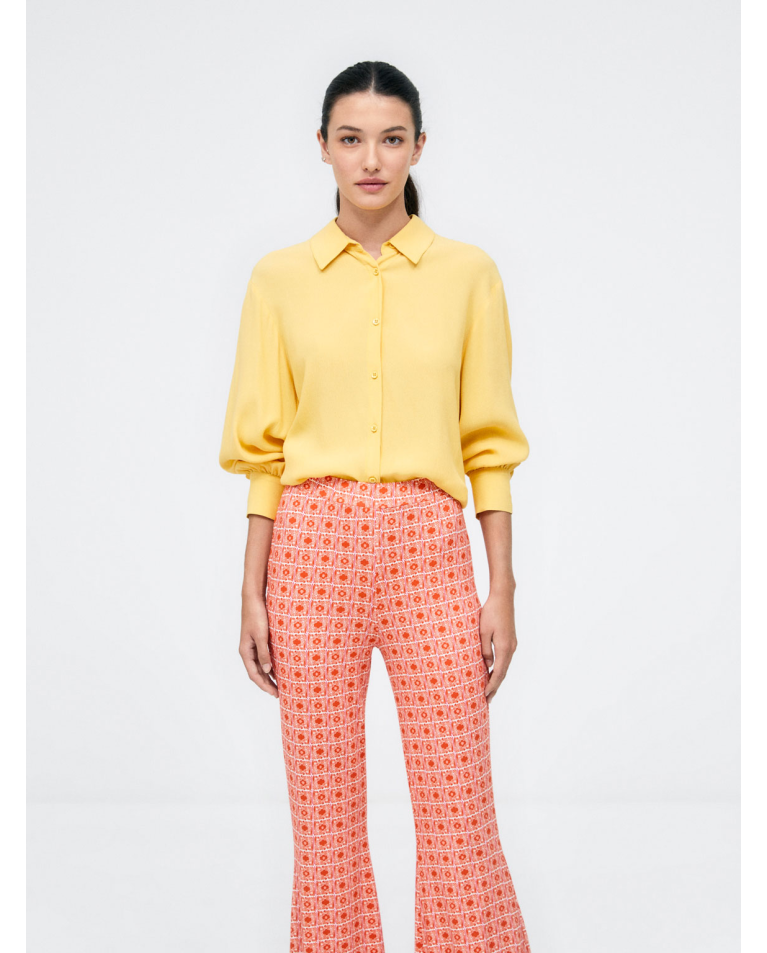 Pantaloni lunghi a campana. Elastico. Stampa Arancione