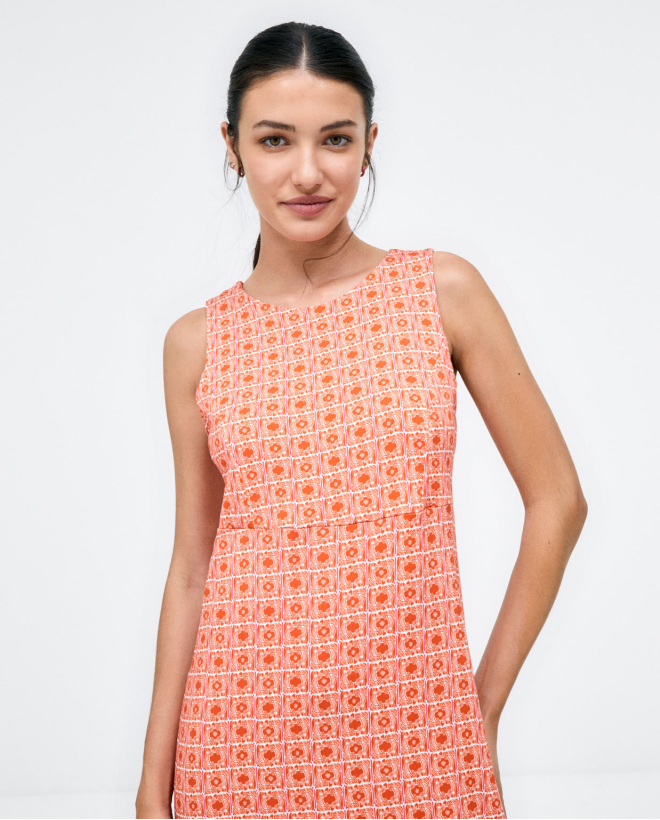 Low-cut back dress. Elastic. e print Orange