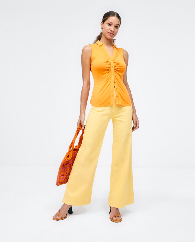 Camicia senza maniche arricciata. Elastico Arancione