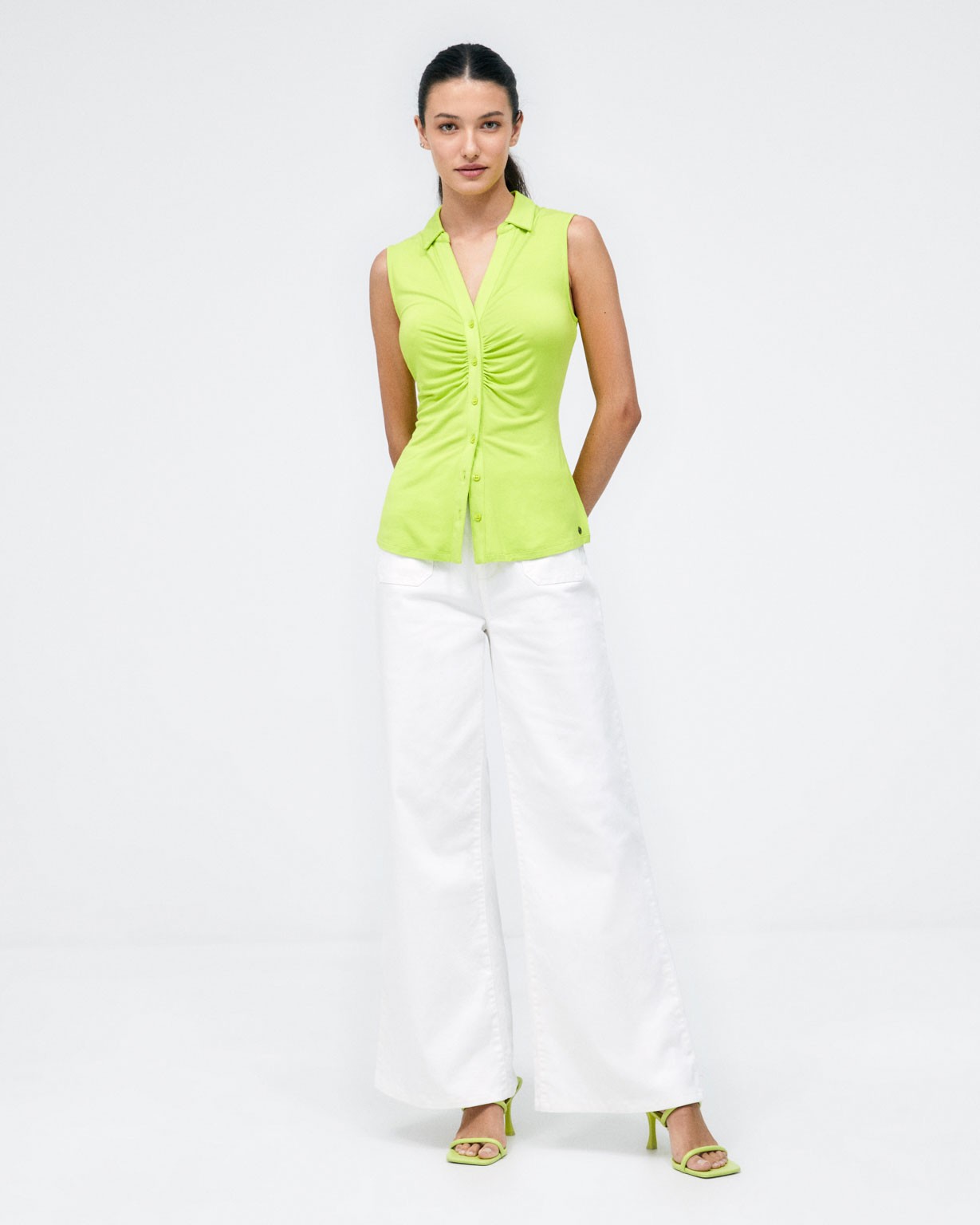 Camicia senza maniche arricciata. Elastico Verde acido