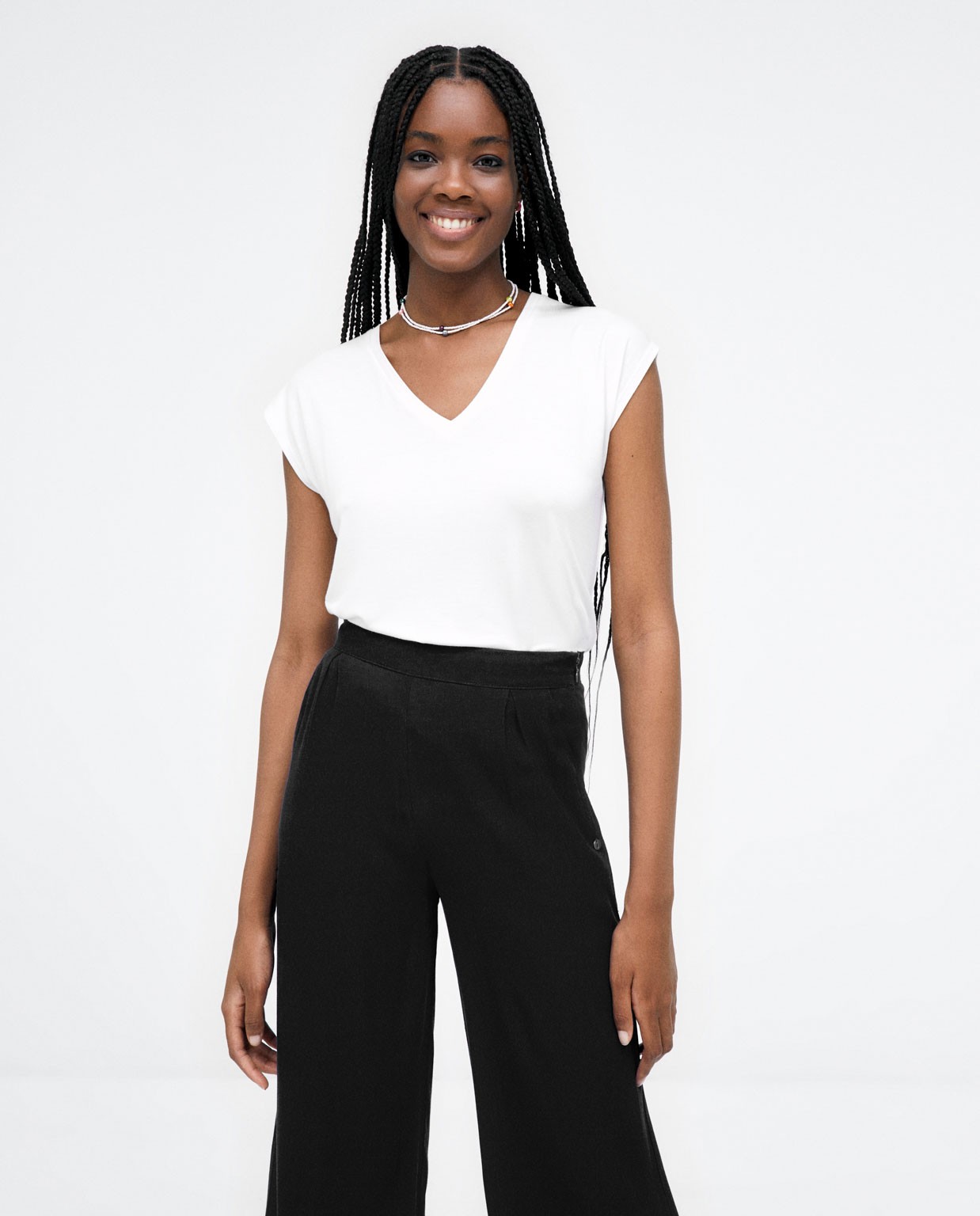 Wide ankle trousers. Plain e Black
