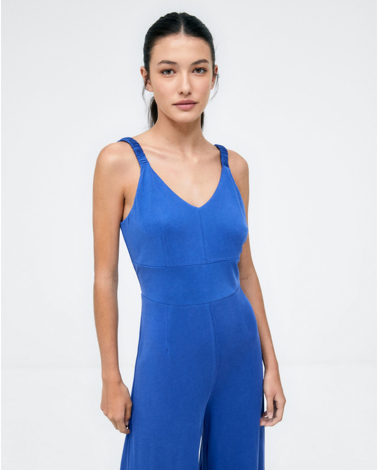 Tuta senza spalline. Stretch. Azzurro