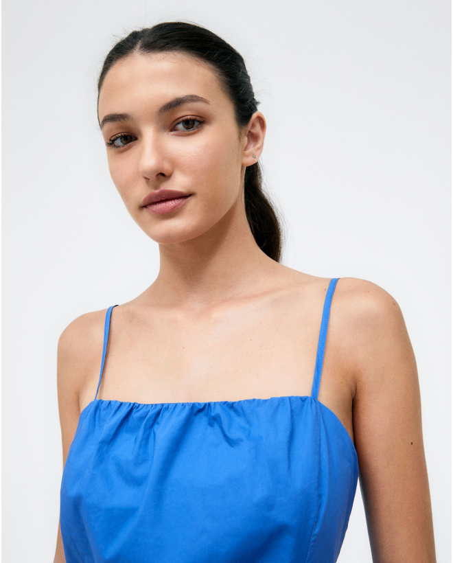 Canotta. Maglia elastica increspata. Lisa Azzurro