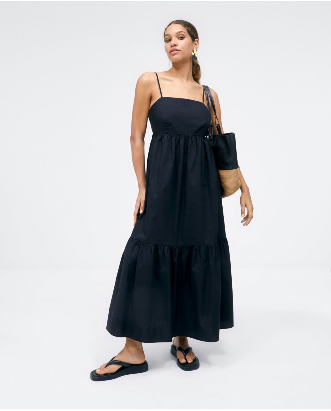 Long dress with straps and ruffle. Plain Black