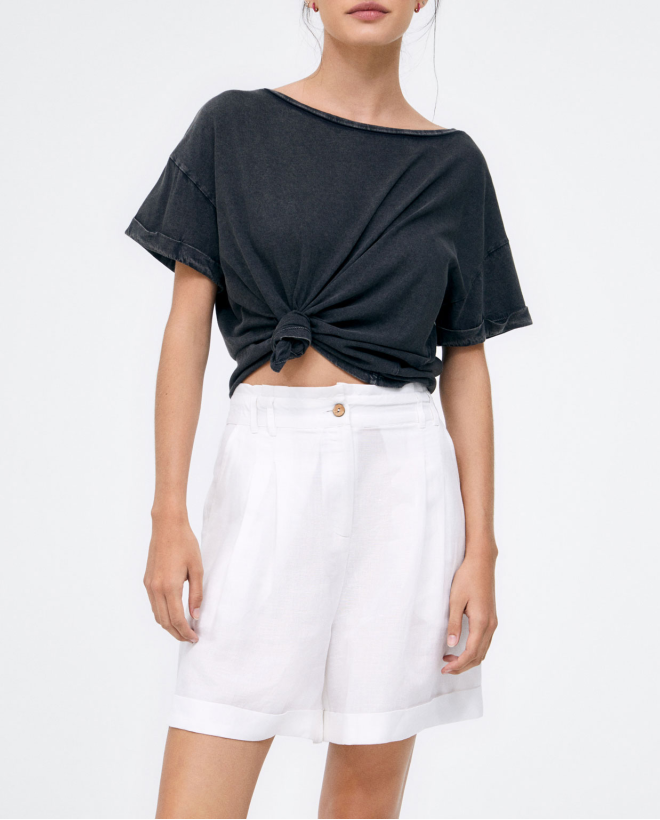 Pantaloncini plissettati. Vita elastica. Liscio Bianco