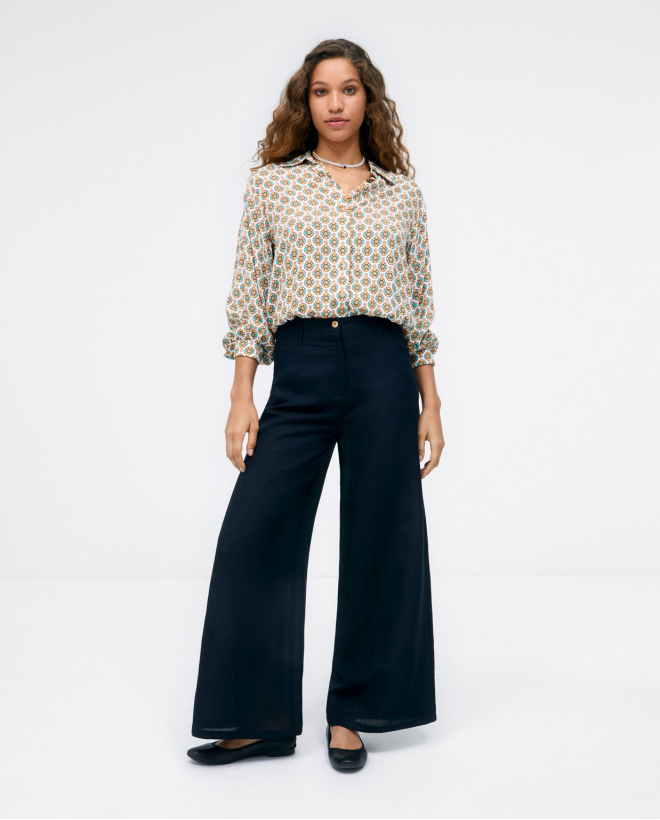 Pantaloni lunghi larghi con tasche. Nero