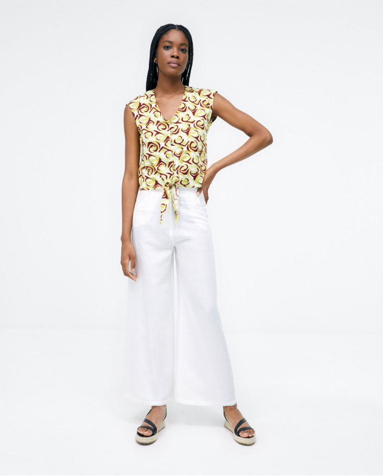 Blouse nouée. Col en V. Imprimé Vert acide