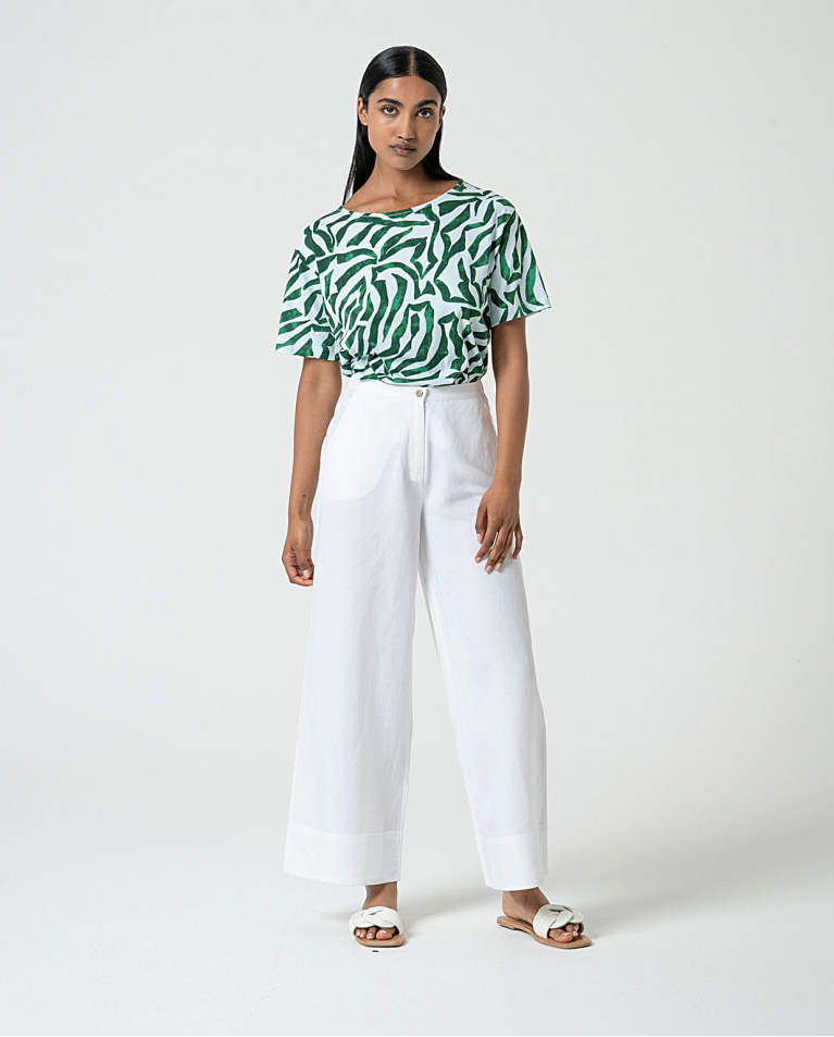 MU:Pantalon avec poche italienne. Blanc cassé