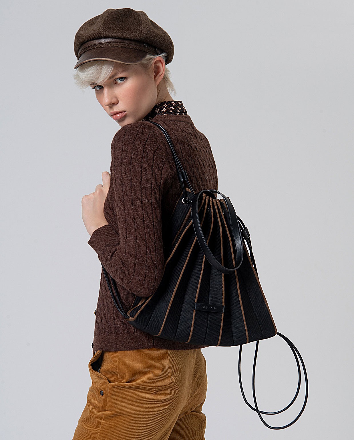 Zaino-borsa a maglia con borsa da toilette Nero