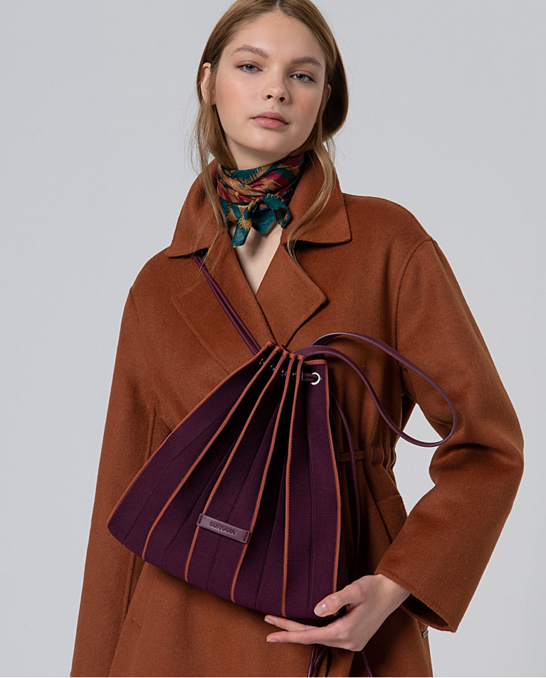 Sac à dos en tricot avec trousse de toilette Marron
