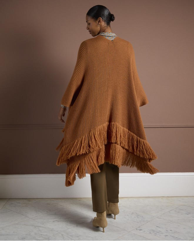 Poncho en tricot avec franges Light came