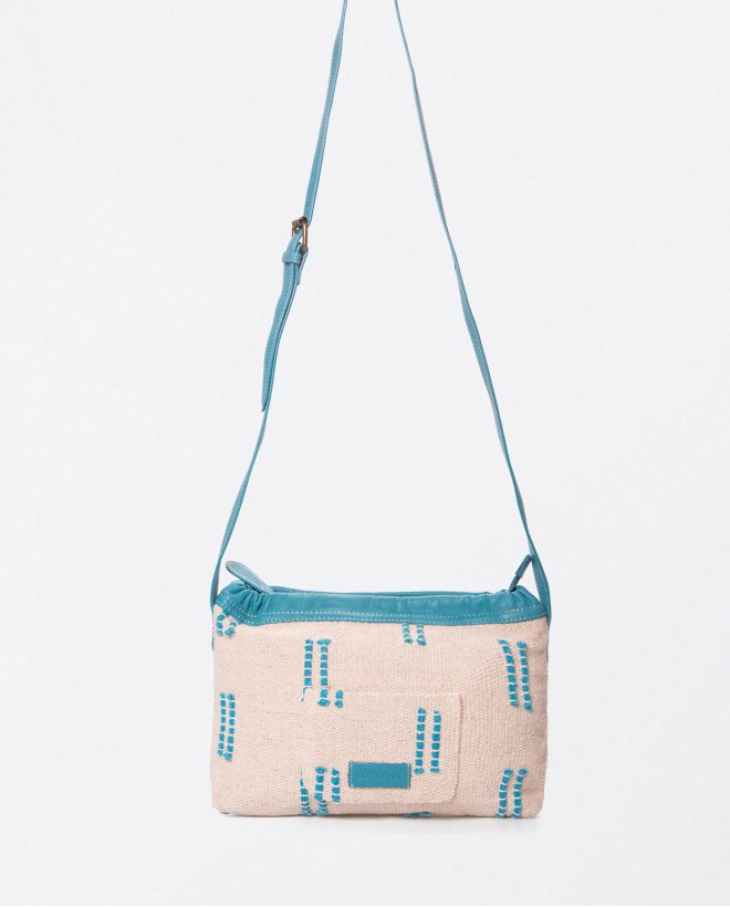 Small shoulder bag with ruffle. Turquoise