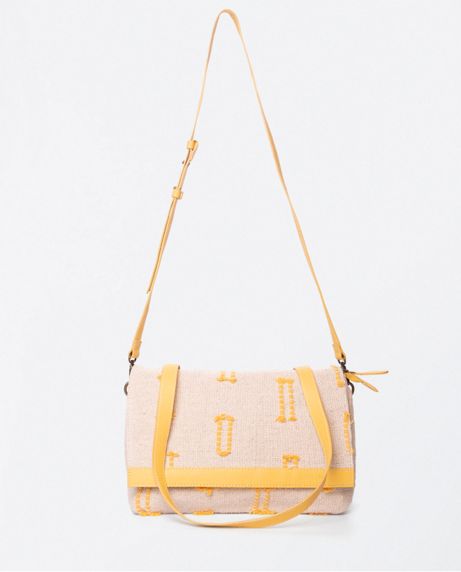 Shoulder bag with flap and short handle. Yellow