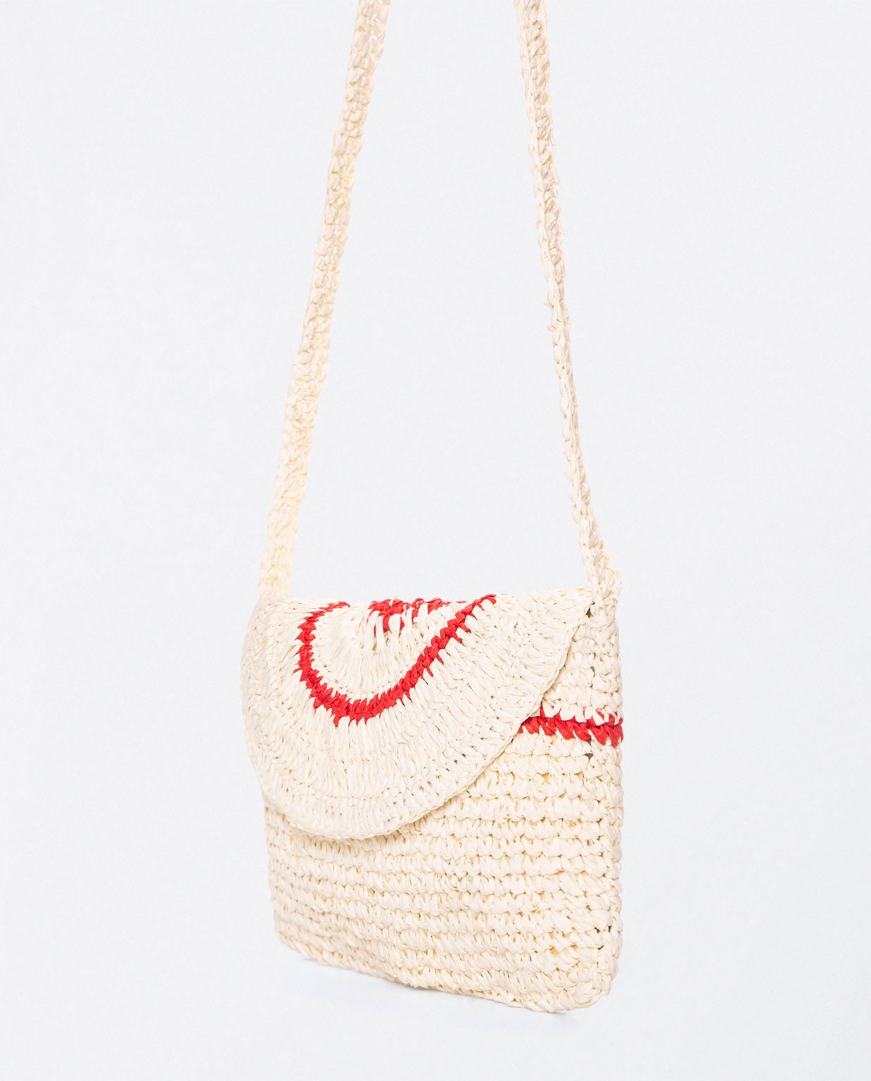 Small shoulder bag with raffia flap. e White