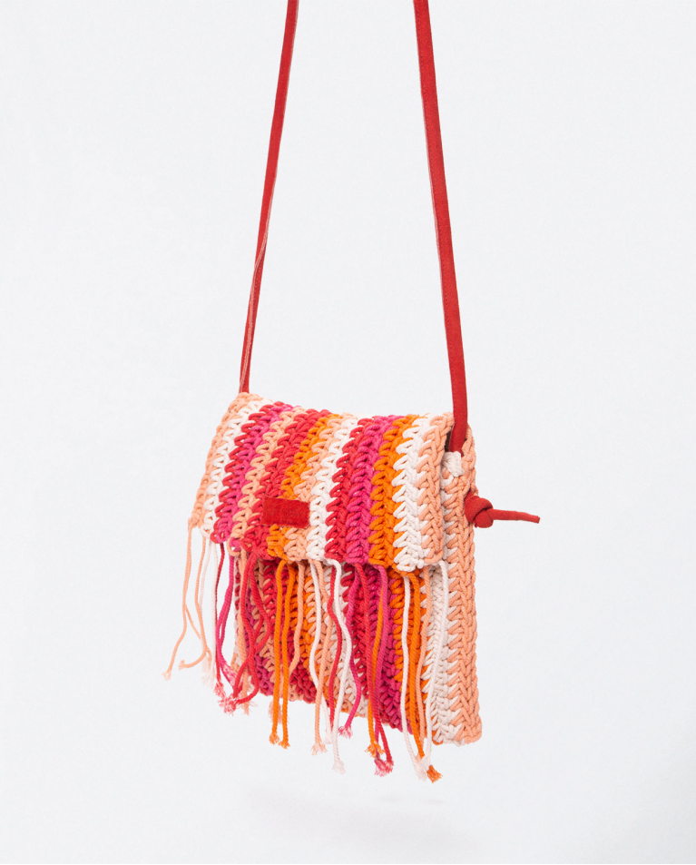 Crochet shoulder bag with fringed flap. Hand knitt Fuchsia