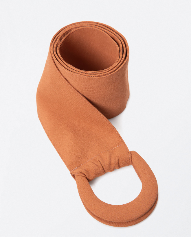 Wide belt in fabric with double buckle. Beige