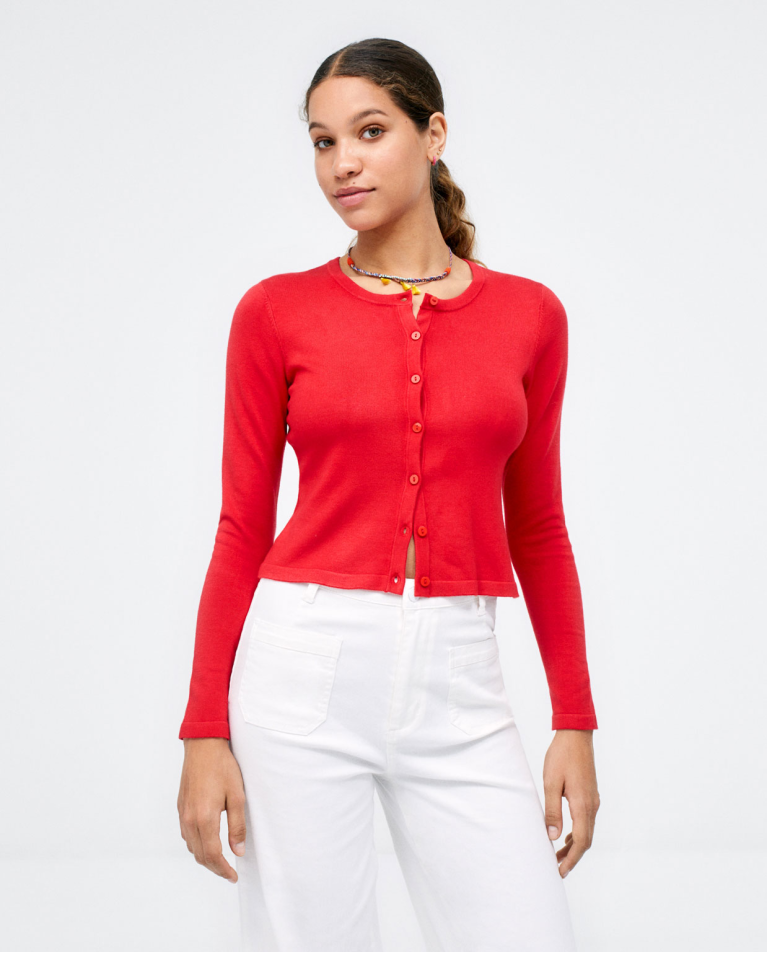 Short knitted cardigan with long sleeves. Plain. Red