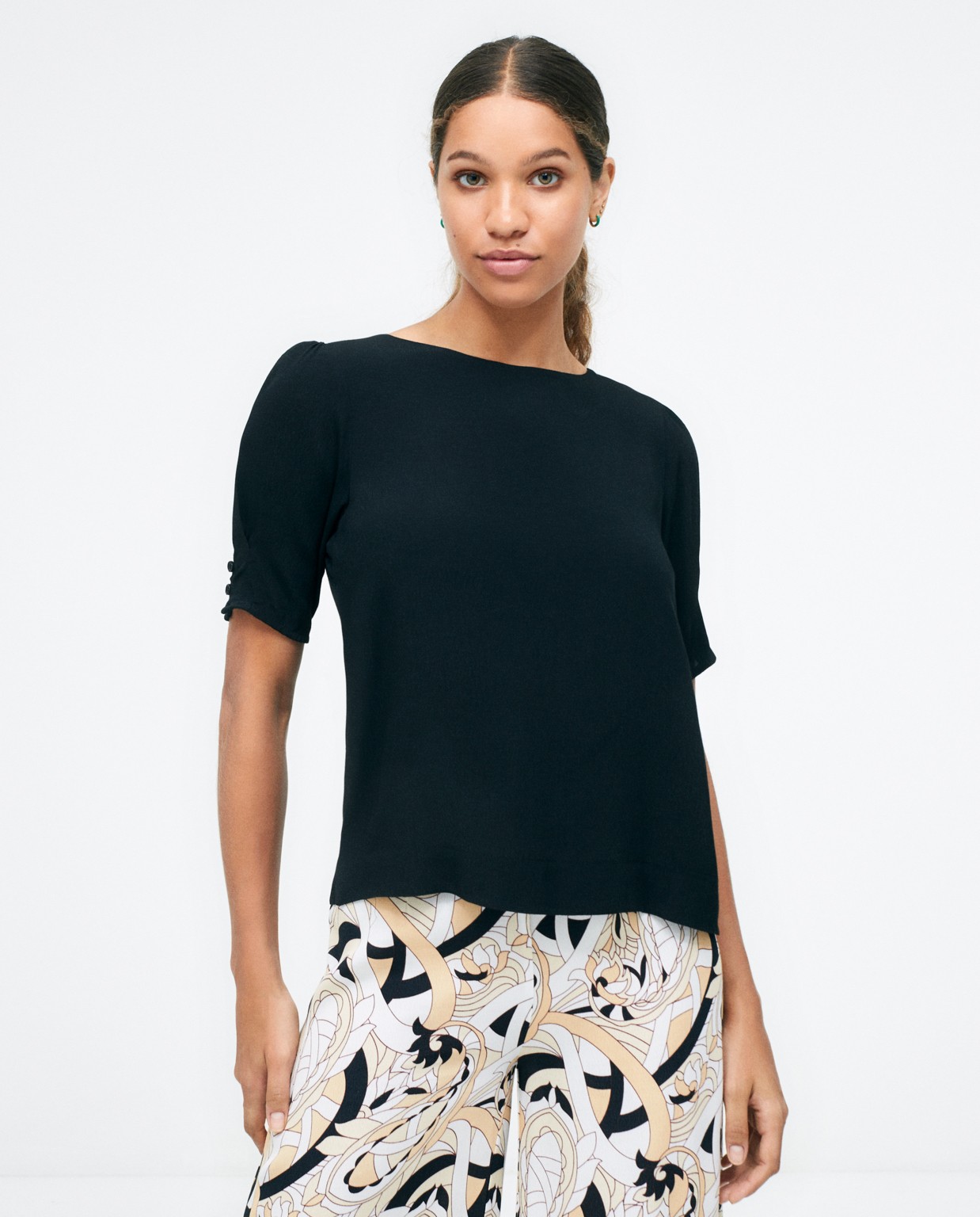 French sleeve blouse with buttoned back.  Black