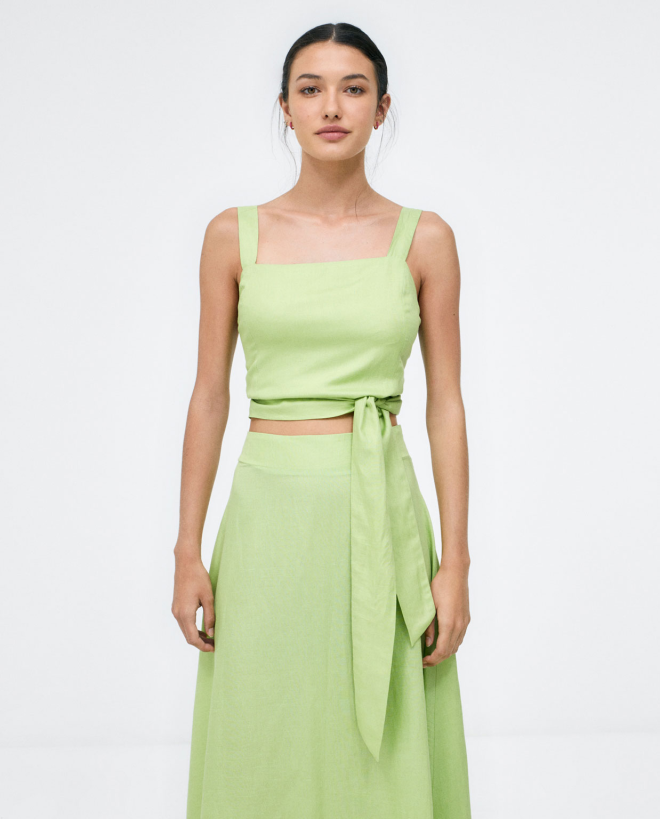 Tank top knotted at the waist. Plain Acid green