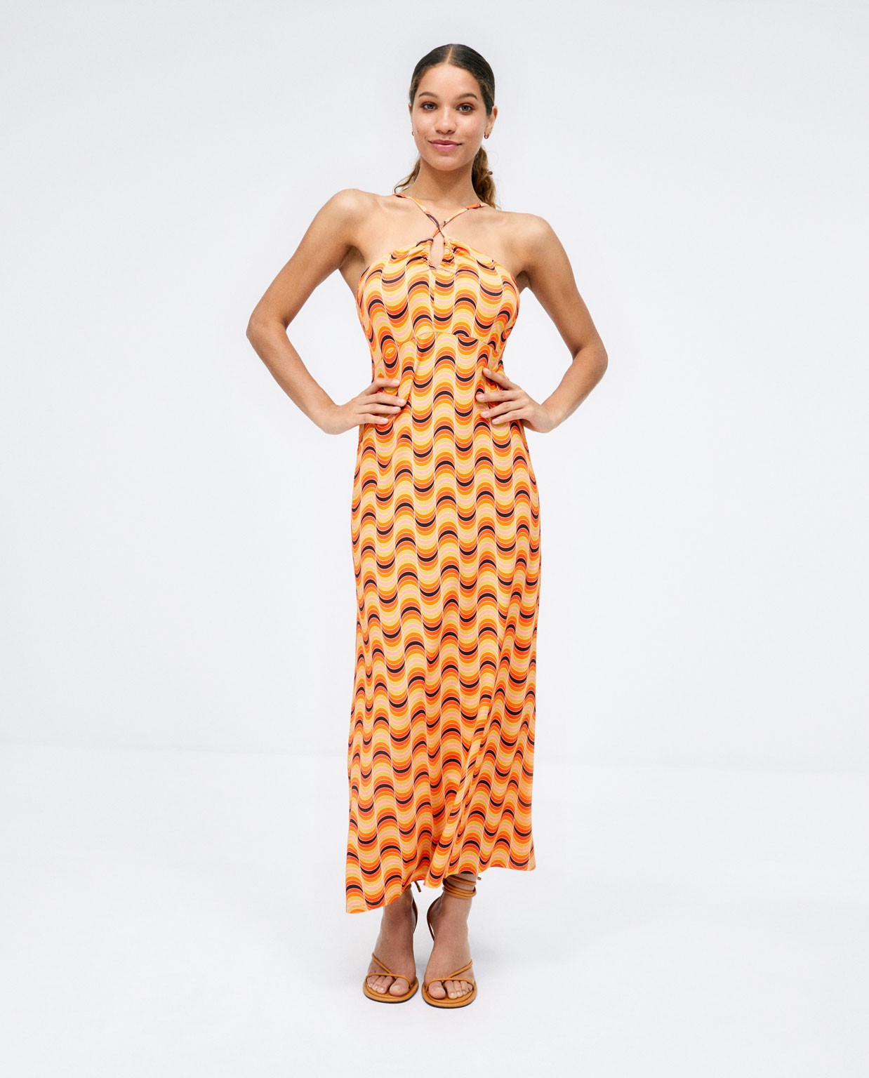 Long dress with crossed straps.  Orange