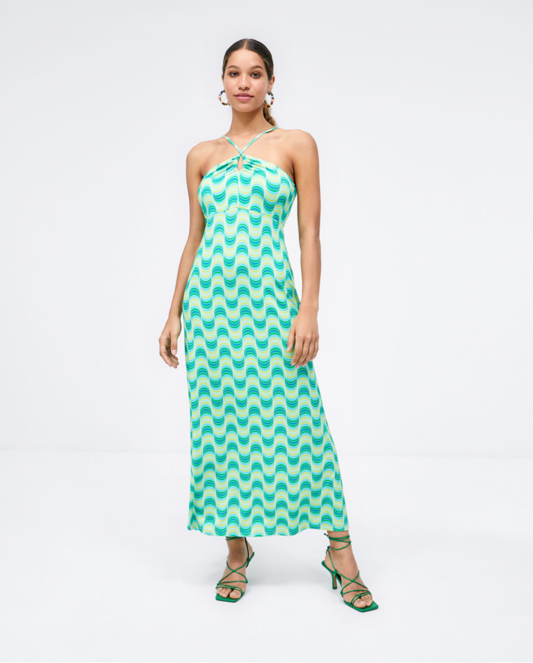 Long dress with crossed straps. Green
